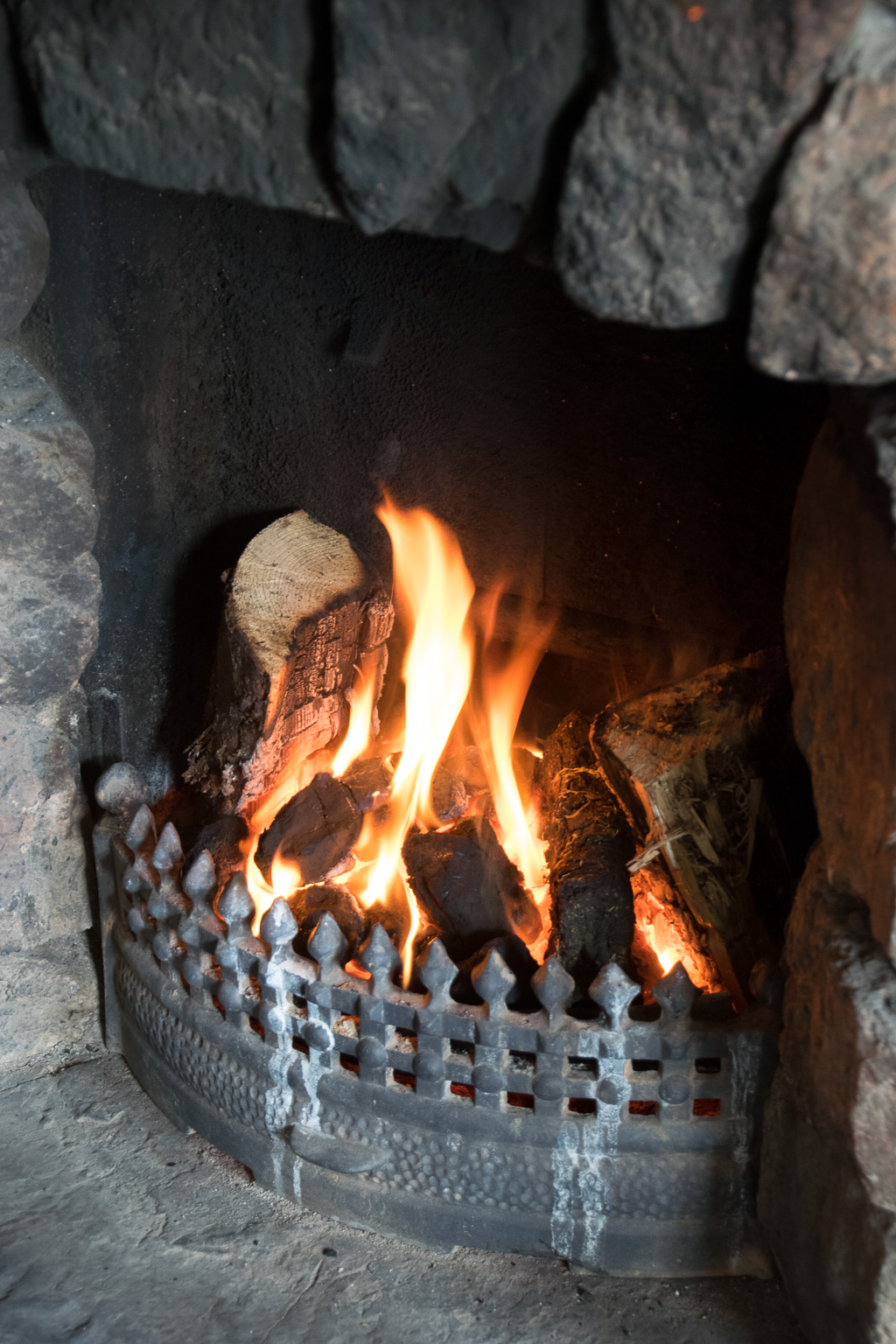 Fireplace burning peat at Leos Tavern Doug Bardwell