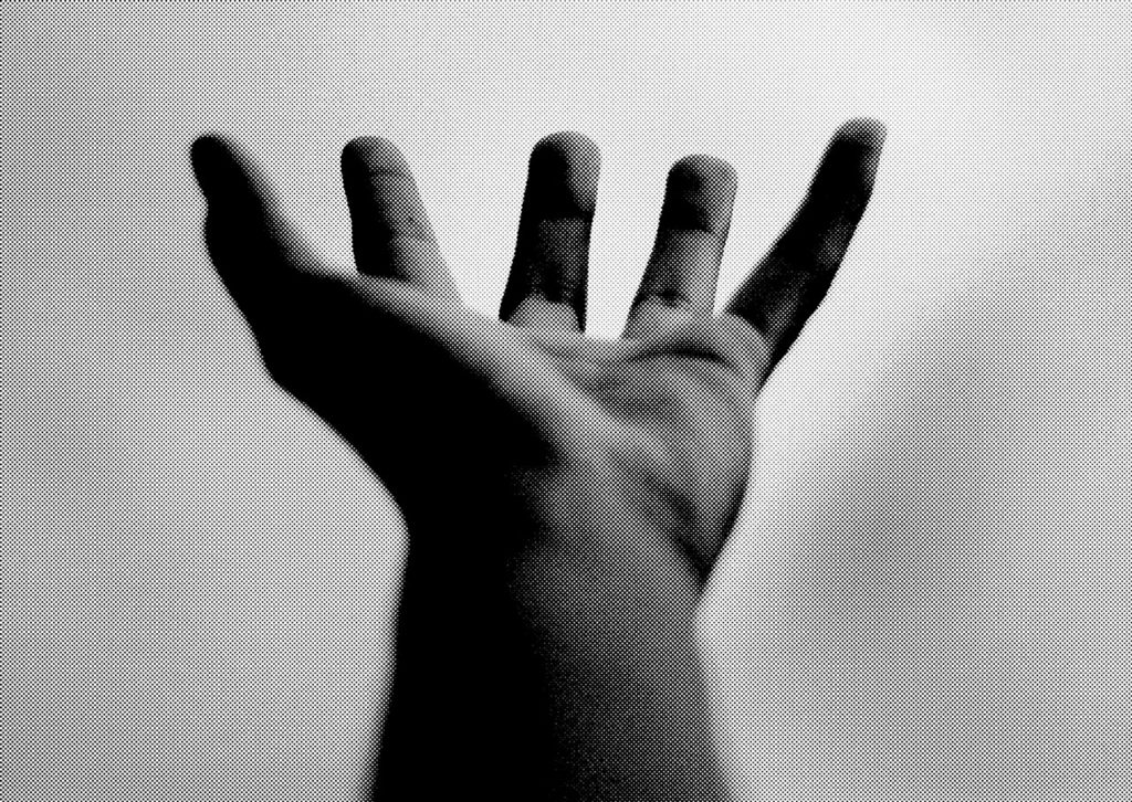 A hand stretching out for help
