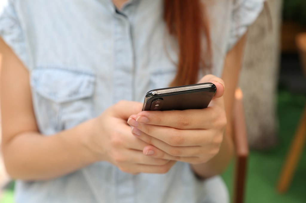 Girl with her new smartphone